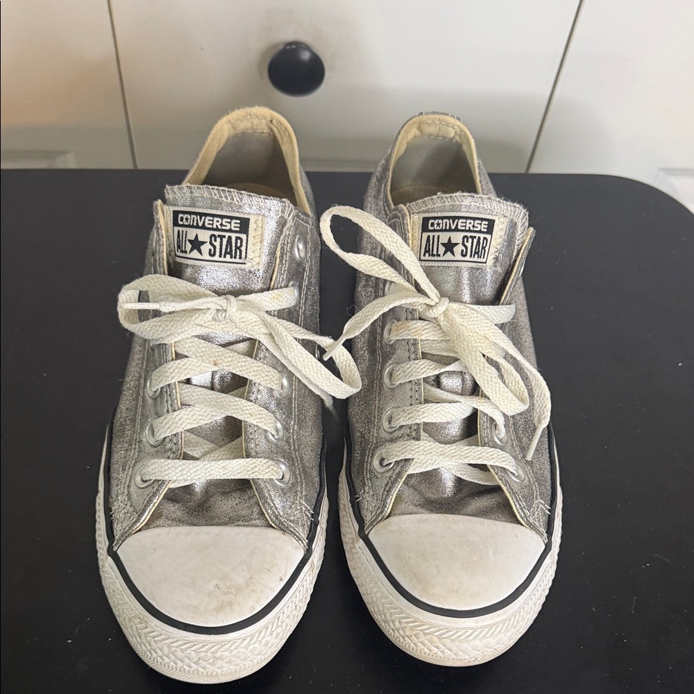 Converse women’s Metallic Silver Sneakers